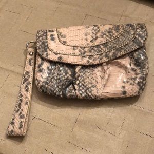 Snakes Wristlet. Jennifer Lopez brand.